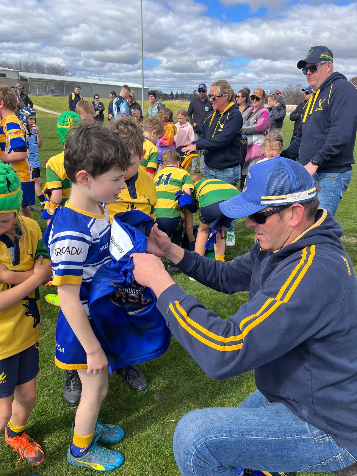 Lane Cove player receiving a Bathurst jersey after a 2023 game
